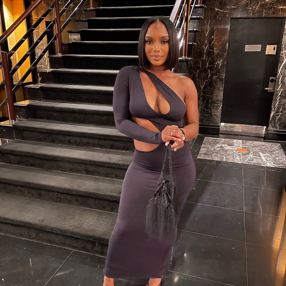 Meshki Dresses & Skirts - Black cut out black form fitting dress.